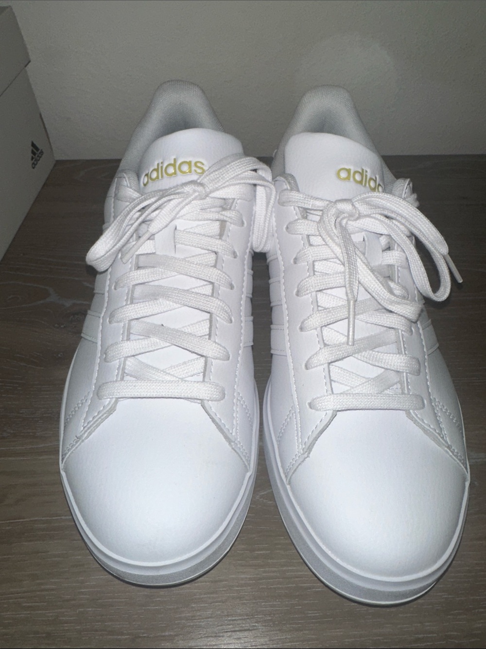 adidas Women's White Sneakers with Gold Branding